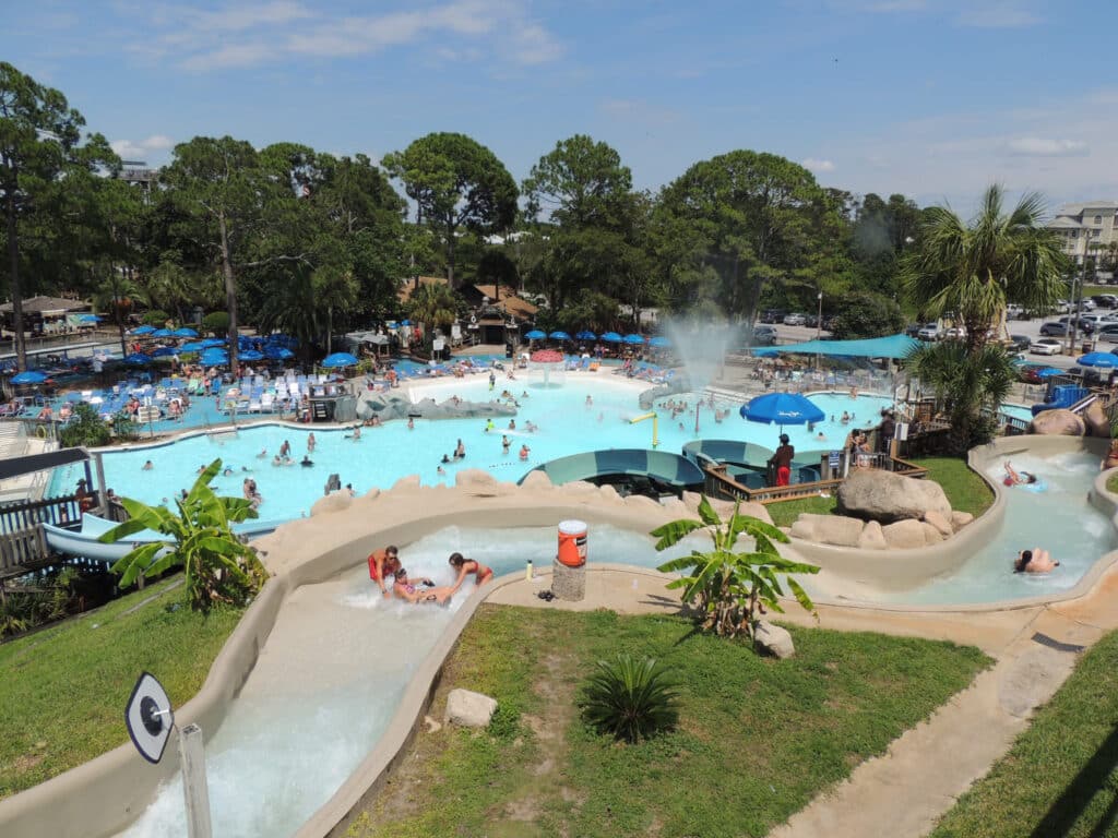 Aerial image of Shipwreck Island Waterpark featuring a large pill and lazy river - one of the top outdoor activities in Panama City Beach.